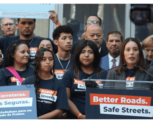 Veronica Garibay speaking to public during press event announcing the submission of over 32,000 signatures to advance Better Roads Safe Streets transportation measure toward November ballot