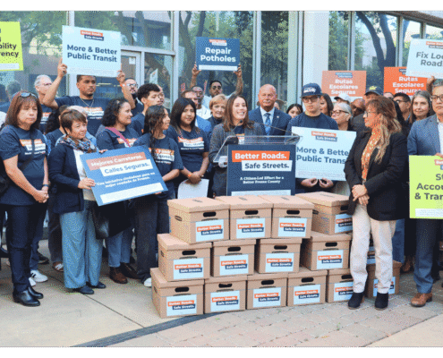 Veronica Garibay speaking to public during press event announcing the submission of over 32,000 signatures to advance Better Roads Safe Streets transportation measure toward November ballot
