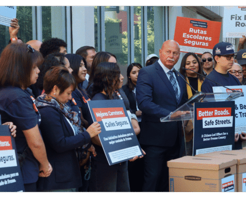 Mayor of Fresno Jerry Dyer speaking to public during press event announcing the submission of over 32,000 signatures to advance Better Roads Safe Streets transportation measure toward November ballot