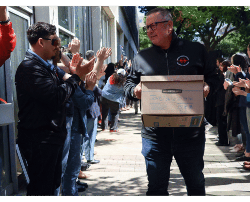 Travis walks one of fifteen boxes comprising of the 32,000 signatures collected by Better Roads, Safe Streets to advance the Better Roads, Safe Streets transportation measure