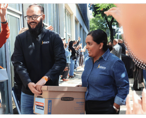 Advocates walk one of fifteen boxes comprising of the 32,000 signatures collected by Better Roads, Safe Streets to advance the Better Roads, Safe Streets transportation measure